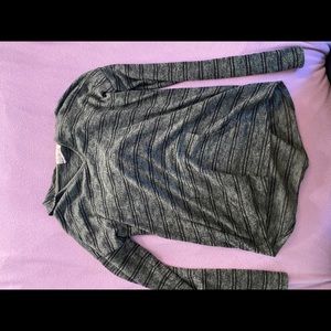 Greens and black sweater